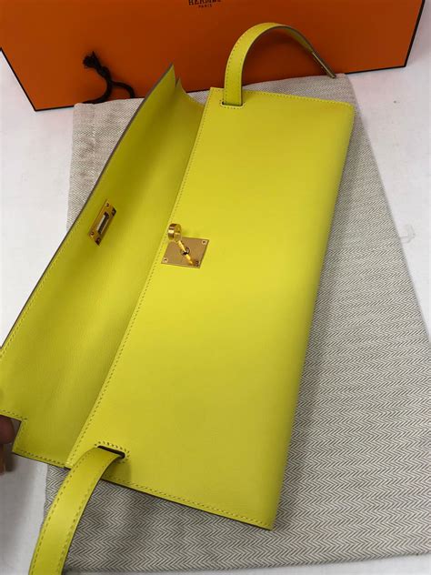 hermes kelly cut clutch size|hermes kelly clutch price.